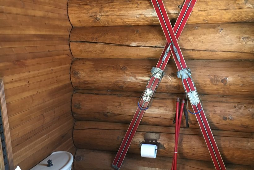 log cabin, guest bath, red skis