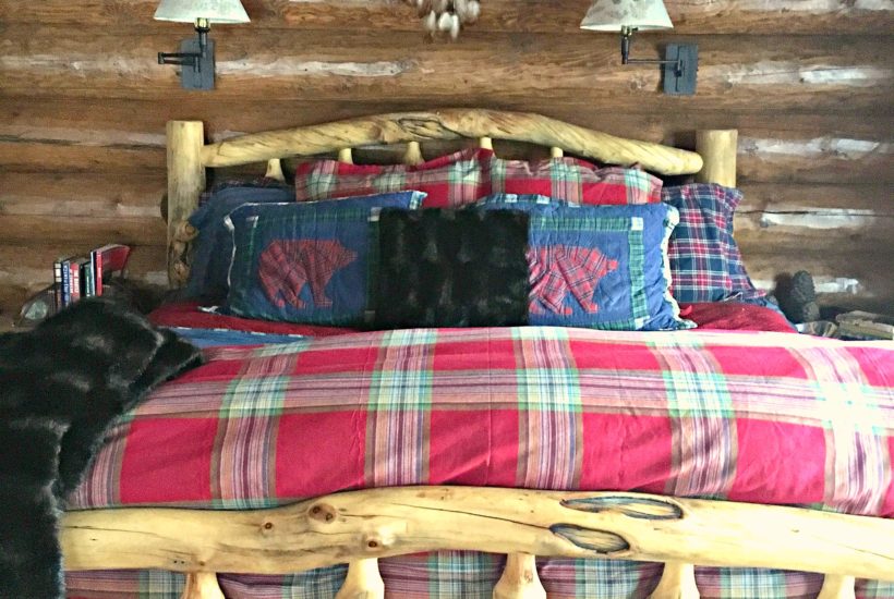 Master Bedroom, cabin, log cabin, log home, dreamcatcher, rustic decor, rustic sconces, plaid bedding, Pottery Barn duvet, log bed