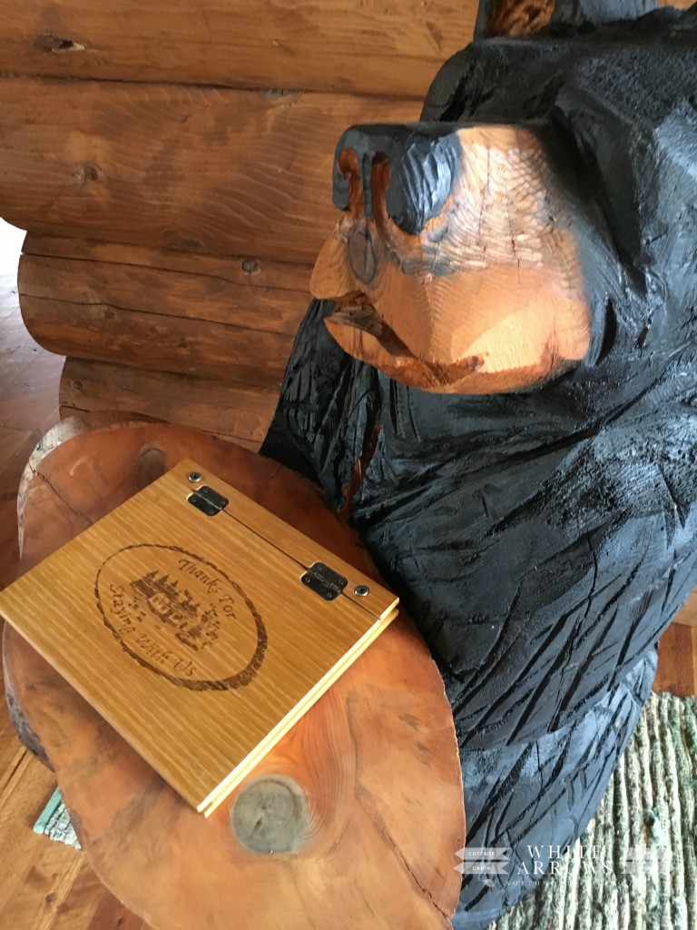 guest book, log home, carved bear
