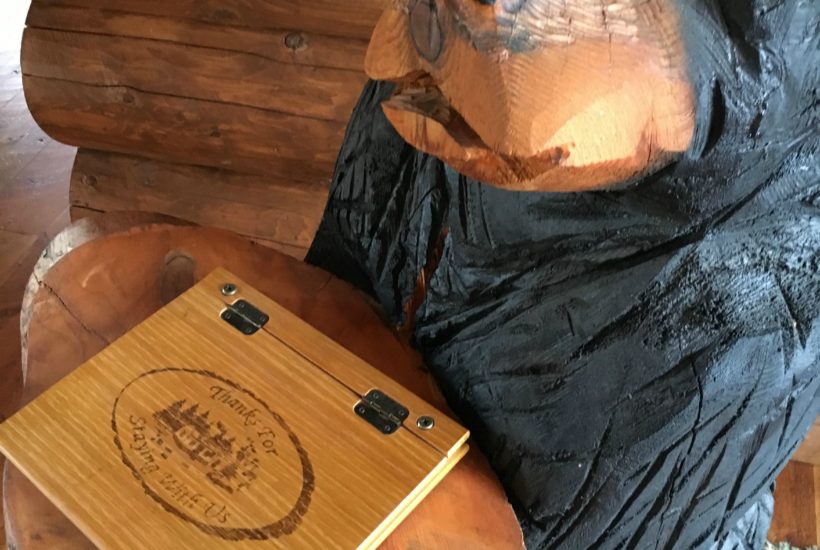 guest book, log home, carved bear