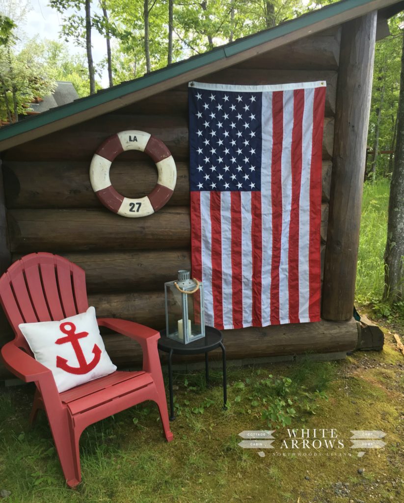 boat house, adirondack chair, american flag, anchor pillow, lake house