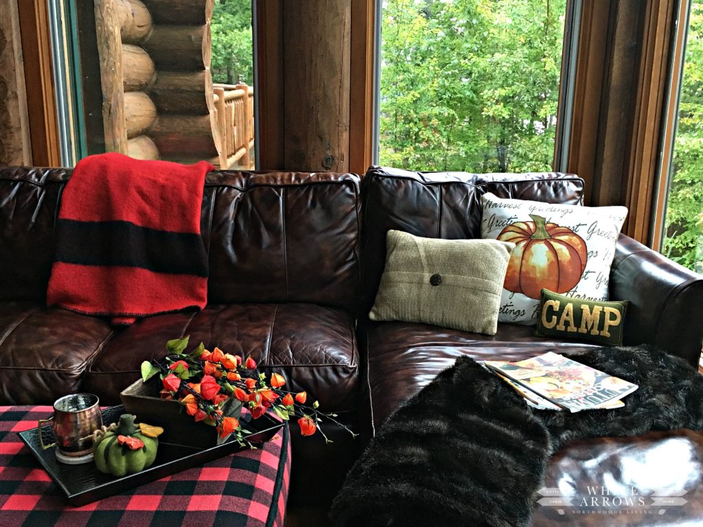leather couch, buffalo plaid, fall decor, camp blanket, log cabin
