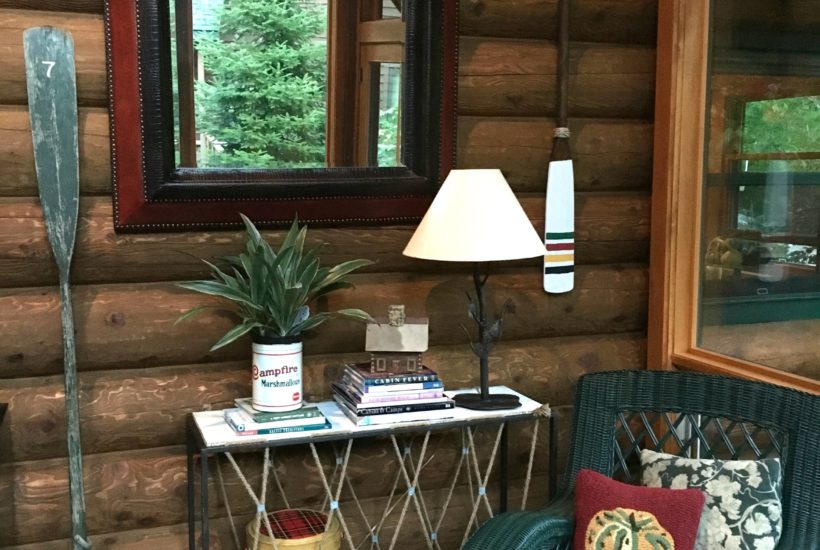 Log Home, cabin style, lake house, paddles and oars, scotch cooler, whicker rocker, camp style, screened in porch, paddles, oars, vintage