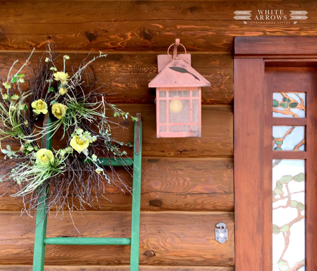 flower wreath, twig wreath, log cabin, rustic sconce, outdoor lighting, cabin, rustic ladder
