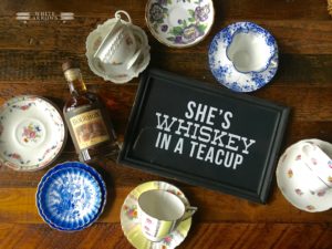vintage teacups and whiskey