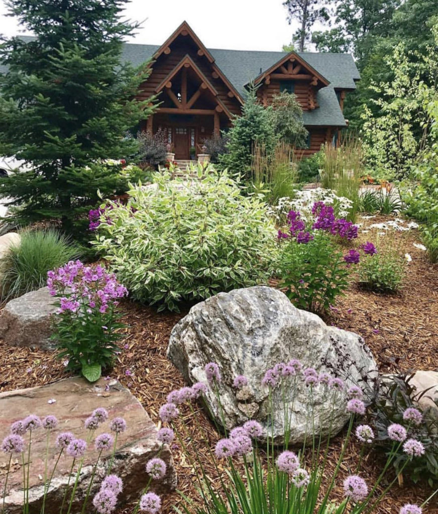 Log Cabin in Minocqua, WI with Summer Flowers