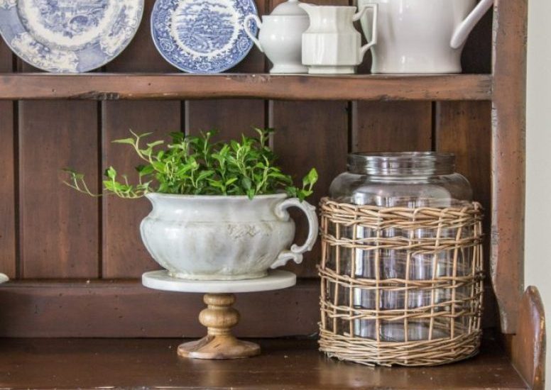 Beautifully styled shelves with Ironware and Transferware on Irish Hutch