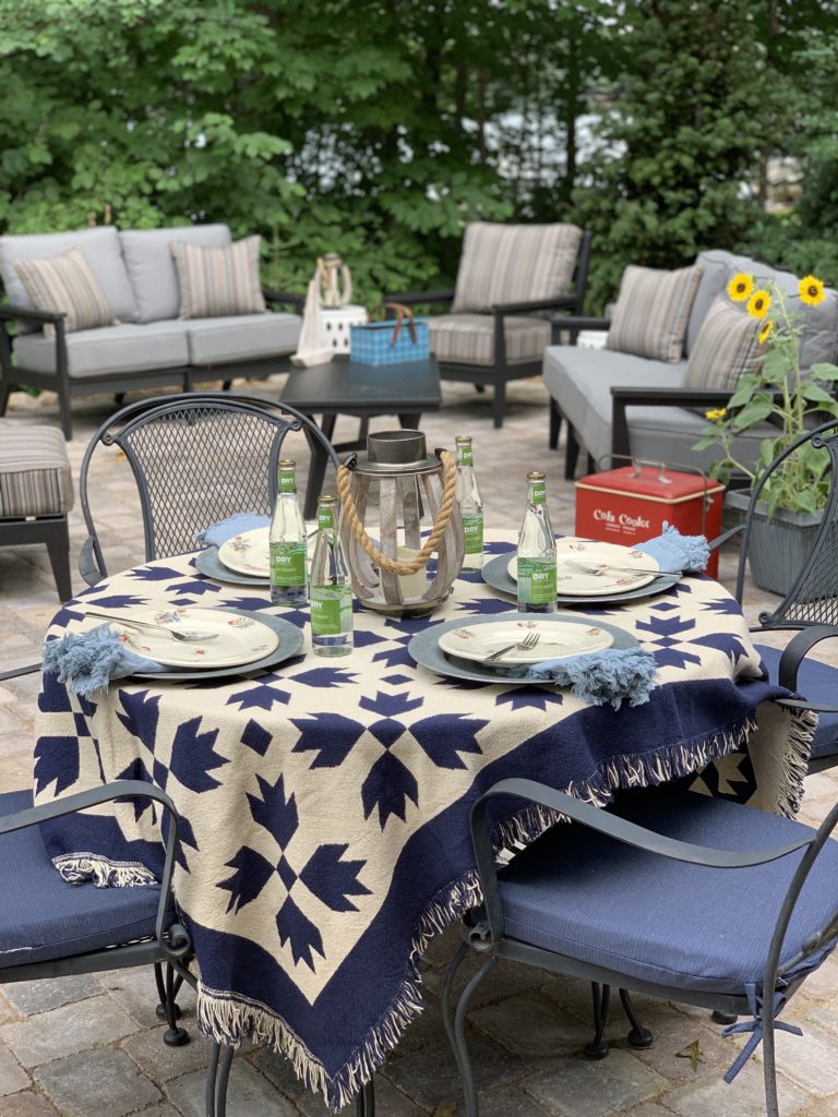 Backyard Patio with blue and white quilt tablecloth