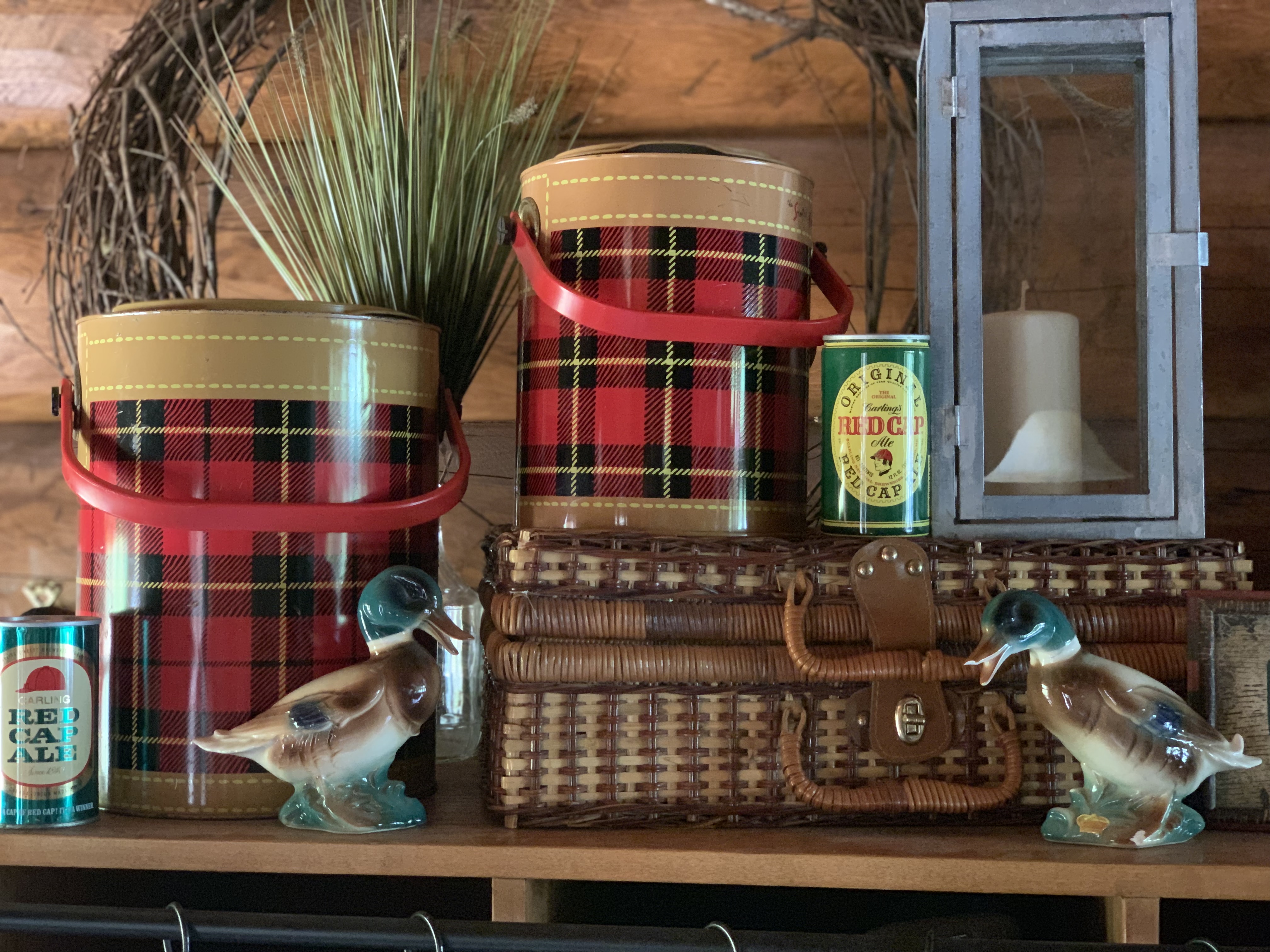 Scotch Plaid coolers and Mallard ducks are fall decor on top of entry way cubbies