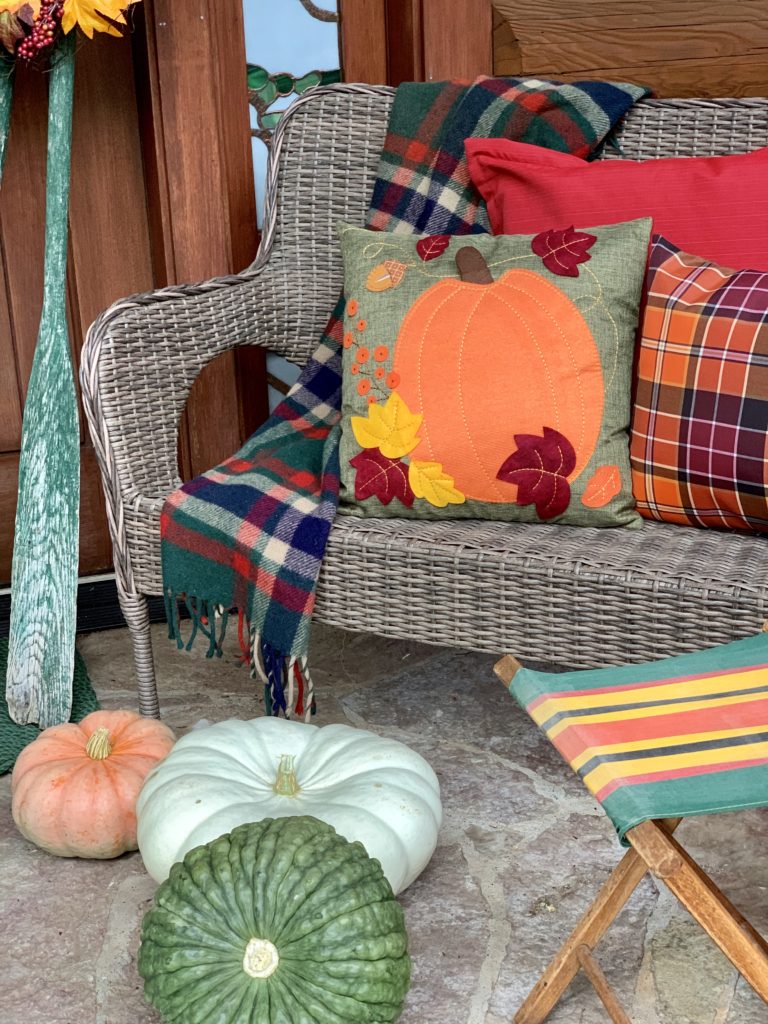 Fall porch with vintage camp stool