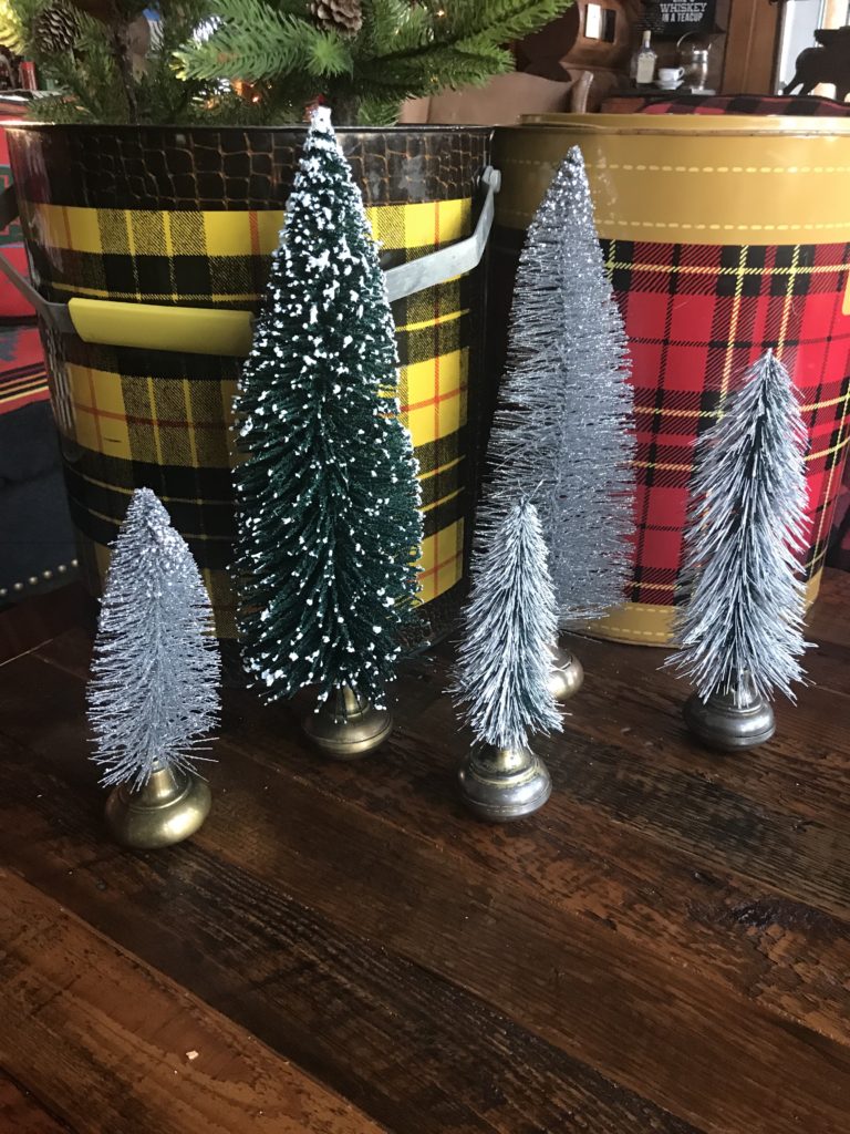 bottle brush Christmas trees in vintage door knobs