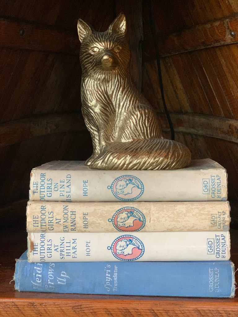 Fox Statue on Vintage Book Stack,
Styling a Bookshelf