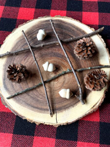 Tic Tac Toe Board Homemade with sticks, acorns and pinecones