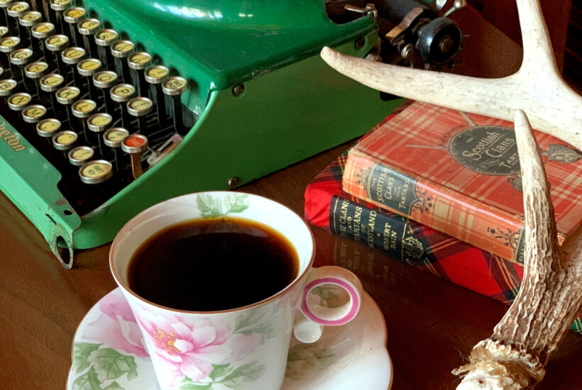 Coffee at the cabin in vintage tea cup