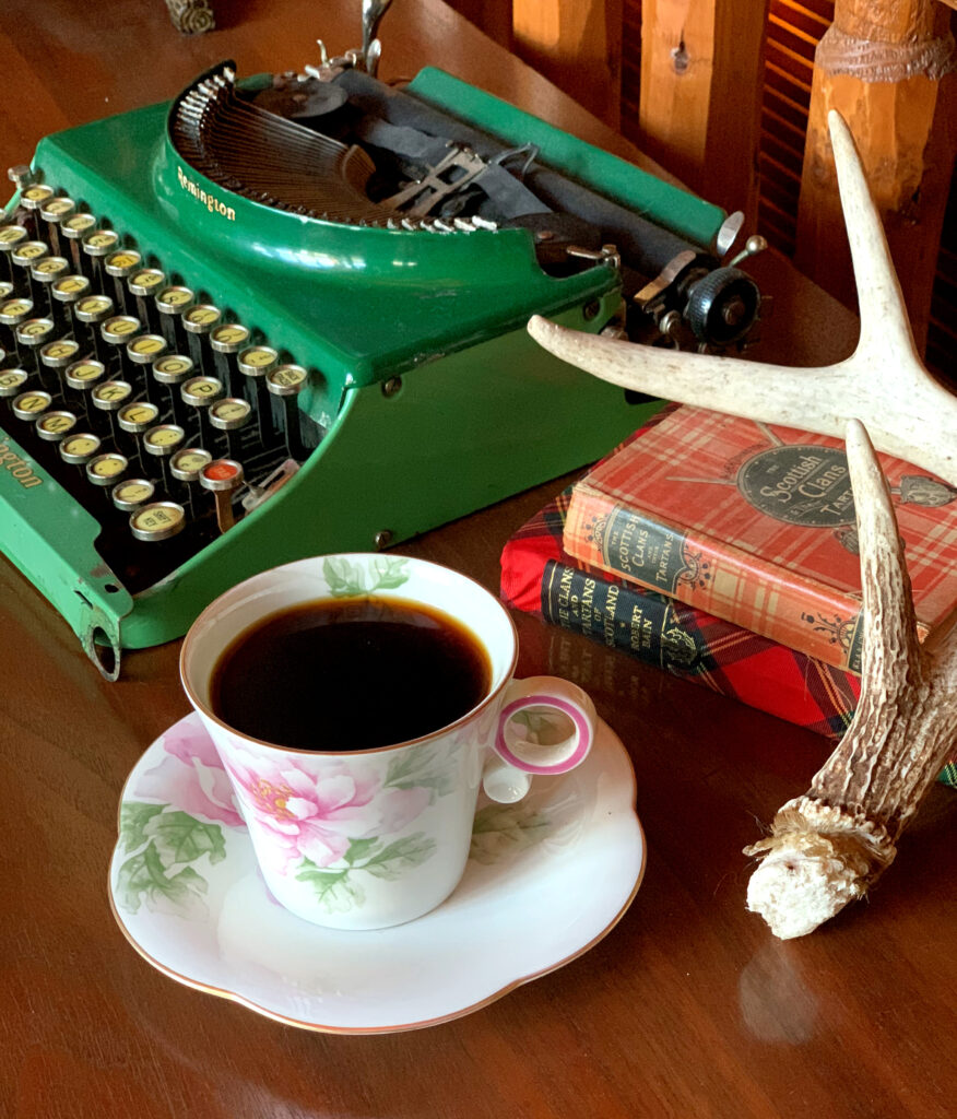 Coffee at the cabin in vintage tea cup