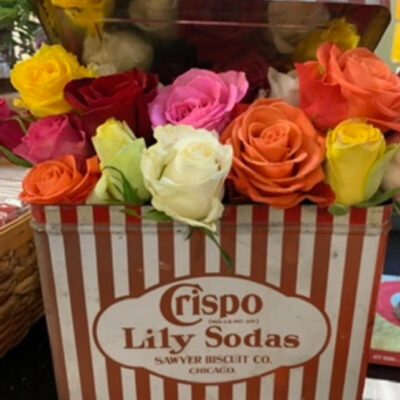 Flower Arrangements in Vintage Containers