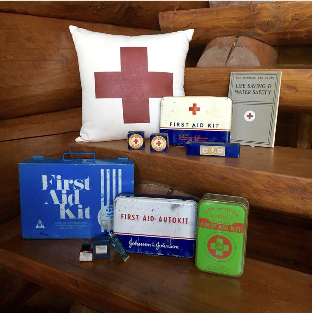 vintage first aid kits, red cross pillow, life saving red cross books