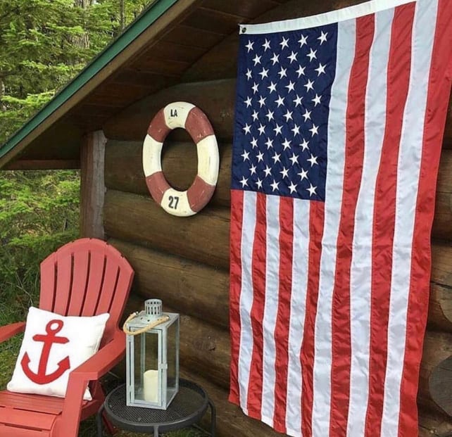 Boathouse decorated with flag and lake decor