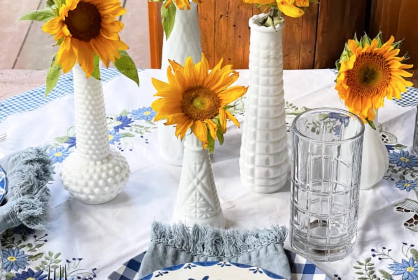 Sunroom Table set for Summer with blue and whites, vintage linens