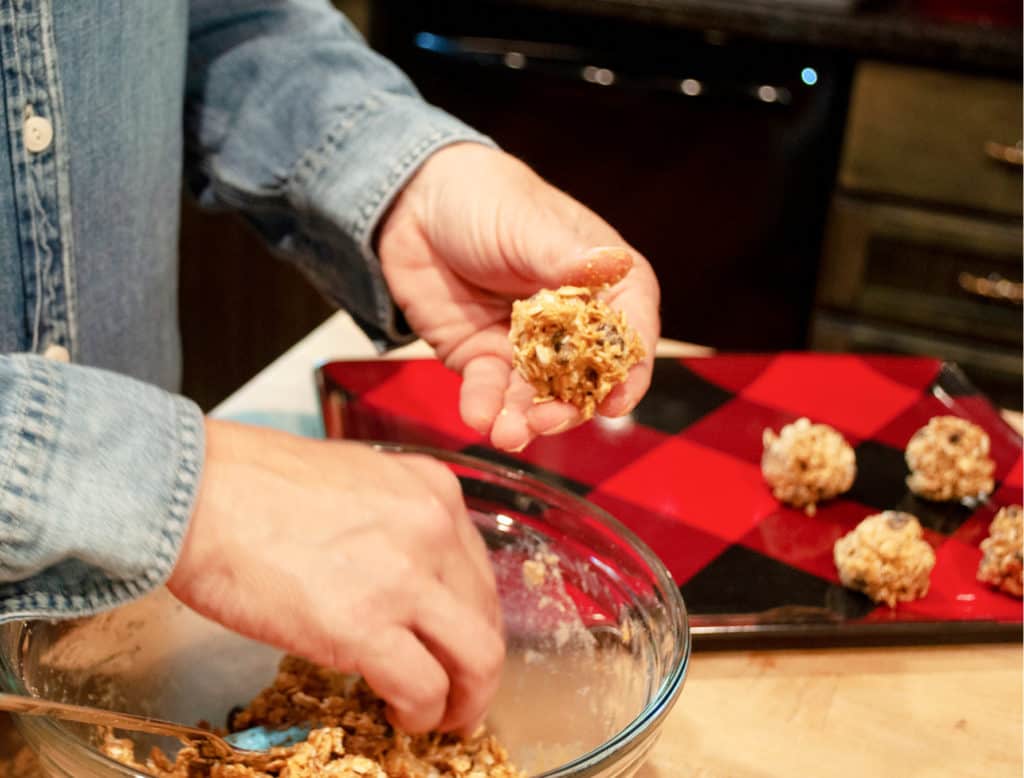 Peanut Butter Protein Balls rolling into balls