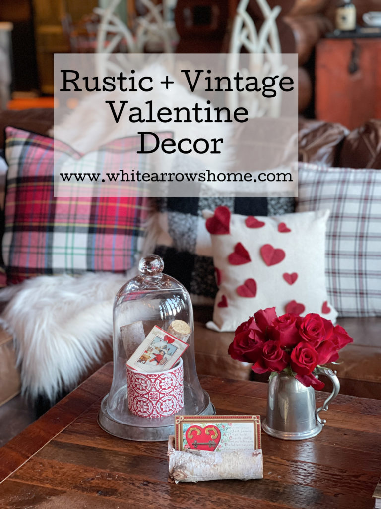 Valentine decor with a vintage card and cloche.