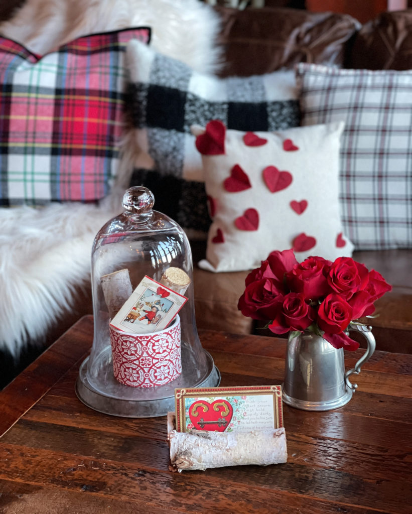 Valentine decor with a vintage card and cloche.