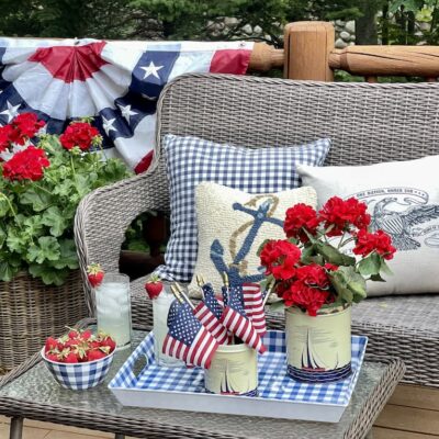Patriotic Porch With a Bunting Backdrop