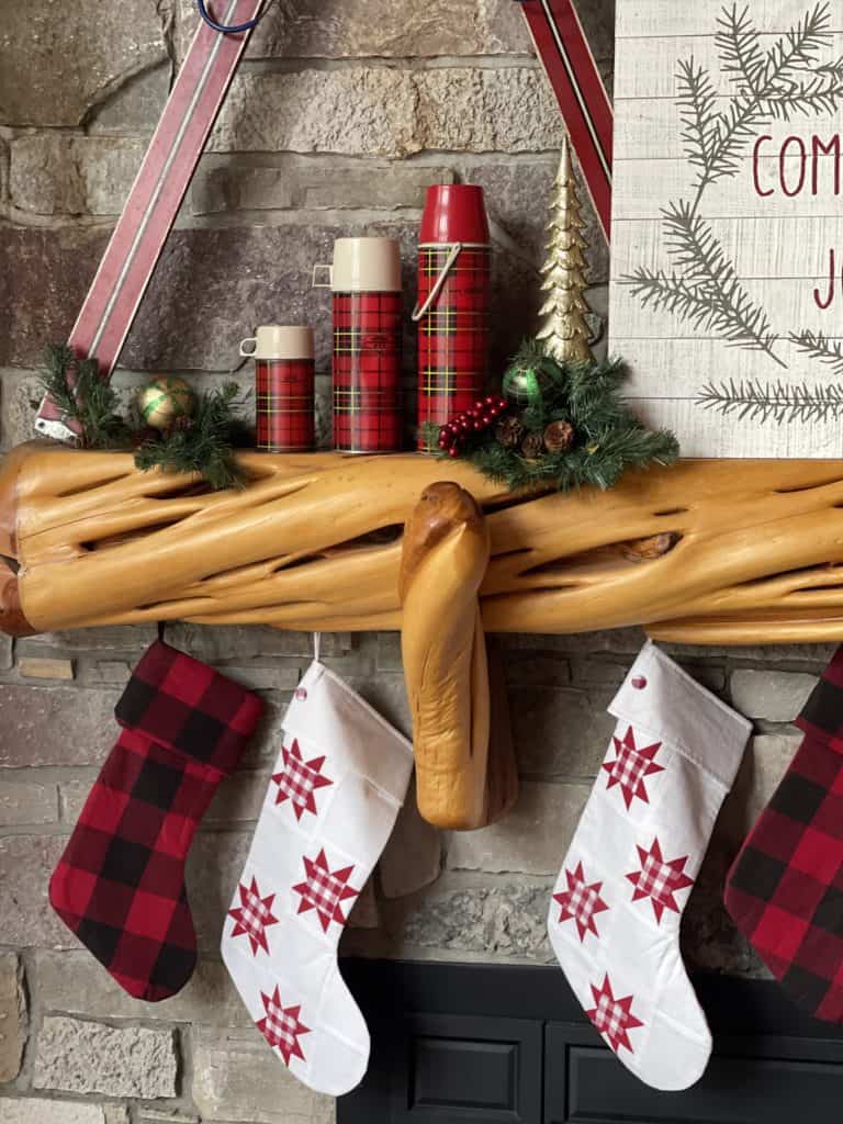 Christmas mantel decor with vintage plaid thermos