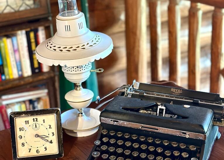 Vintage desk decor, lamp, clock and typewriter
