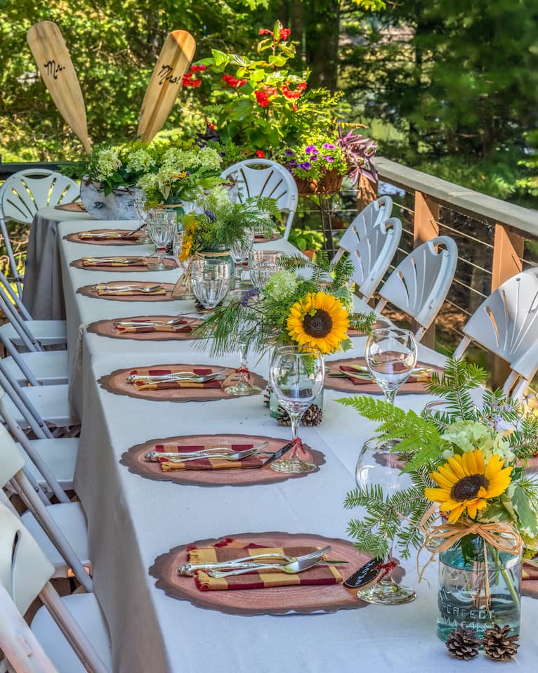 Rustic Tablescape with sunflowers on lakeside deck
